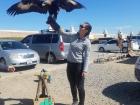 Holding an eagle in Kharkhorin, Mongolia