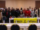 A group photo of everyone that came to listen and learn about migrants and refugees