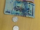 10,000, 2,000 and 200 Ugandan shillings 