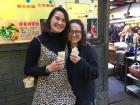 Paige and me enjoying a snack on the famed 户部巷 (HuBuXiang), Wuhan's food street 