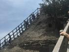 The stairs leading up the volcano are steep and the ones leading down are slippery from all the wet mud!