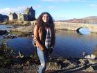 In front of the Eileen Donan Castle in Scotland
