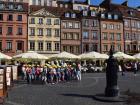 Do you see the group of school children visiting the Old Town Center of Warsaw?