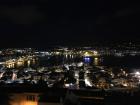 A view of the city lights at night. I took this photo while standing at the top of the castle!