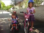 Irene is very active. Here she is, getting ready to ride her bike with her sister!