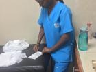 Busy folding new gauze pads for patients at the local clinic