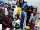 Marcela (Mrs. Mueller) and her class during a Halloween costume party at Saturday school