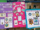There are big and bright posters made to celebrate National Shield of Arms day at schools in Ecuador