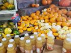 Pumpkins, squash, and apple cider are locally produced items that can be found in most American supermarkets during the autumn months.