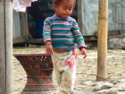 A baby playing in Ghandruk, Nepal 