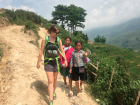 Two girls walk and chat with me during our trek in Sa Pa. Instead of going to school that day, they walk to sell bracelets and small gifts to tourists in a neighboring town.