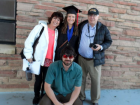 Josh's mother and father with us on my college graduation day. 