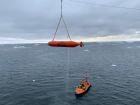 An AUV being rescued from the water