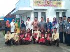 With my volunteer students and government officials at the now popular Breakfast House (a free breakfast program started by an Indonesian English teacher and me)