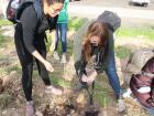 My friend Caroline and I planting our trees