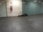 A man sleeping in the metro station