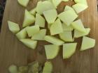 Skin and cut up the potatoes into small, even chunks