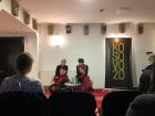 Kosovo 2.0 also hosts community events in its office, such as this poetry reading by two Albanian women