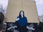 An artist in Mitrovica works to revitalize the city with inspirational wall art