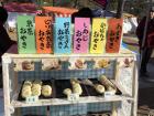 A food stall serving steamed buns with various vegetables inside