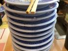 At a revolving belt sushi restaurant, you keep the plates to know how much to pay
