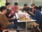 Hiroki and his friends playing board games in the cafeteria after school