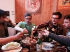 Me and some friends eating a style of food in China called "Hot Pot", where you dip everything into hot soup!