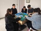 My friends and me playing Majiang, a popular Chinese game