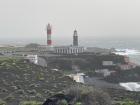 The lighthouse is hard to see because of the "calima" (dust)