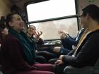 Playing games on the train helps pass the time