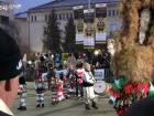 Red, white and green Kukeri dressed to represent Bulgaria