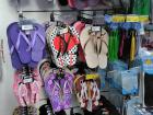 The weather can affect culture. Many stores, even grocery stores, in Brazil sell flip-flops because of the warm weather