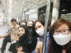 On the subway with friends: we need masks today since the air quality is poor