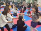 Teaching Korean Kids how to play Duck, Duck Goose!