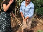 My host mom and I pulling out yucca to cook with in the forest in the Chiquitano region