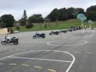For my motorcycle class, we practiced riding a motorbike on a basketball court first before going on the roads