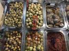 A variety of pickled and spiced olives at the local market