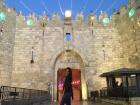 The Damascus Gate of the Jerusalem Old City adorned with star and crescent moon decorations for Ramadan