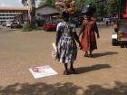 Women on their way to sell kente cloth
