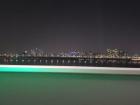 A nighttime view of the Han river from a subway