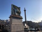 While the other corners have statues, this corner of Trafalgar Square has a sculpture of modern art