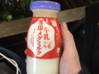 This is a glass milk bottle-- the blue and red colors are all plastic that was unnecessary as the cap is replaceable