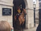 The Buckingham Palace in London is surrounded by guards