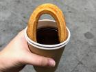 At the fair, I tried chocolate with churros, a traditional Spanish snack 