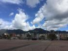 Clouds casting shadows across the mountains