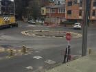 The stop signs are in Spanish, so they say PARE, which comes from the Spanish verb parar (to stop)