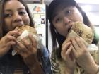 My friend Grace and I trying falafel for the first time, which is a vegetarian treat that originated in Egypt-- it's almost like a sandwich and it was quite tasty!