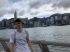 Me in front of part of Hong Kong's skyline