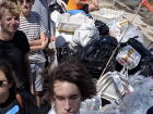 Can you spot me in the cleanup group, along with some of the trash we collected from a stretch of beach?