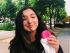 Here I am holding a raspberry macaron half the size of my face!